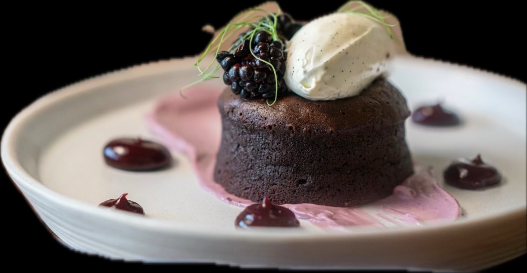 Chocolate fondant with blackberries and vanilla ice cream