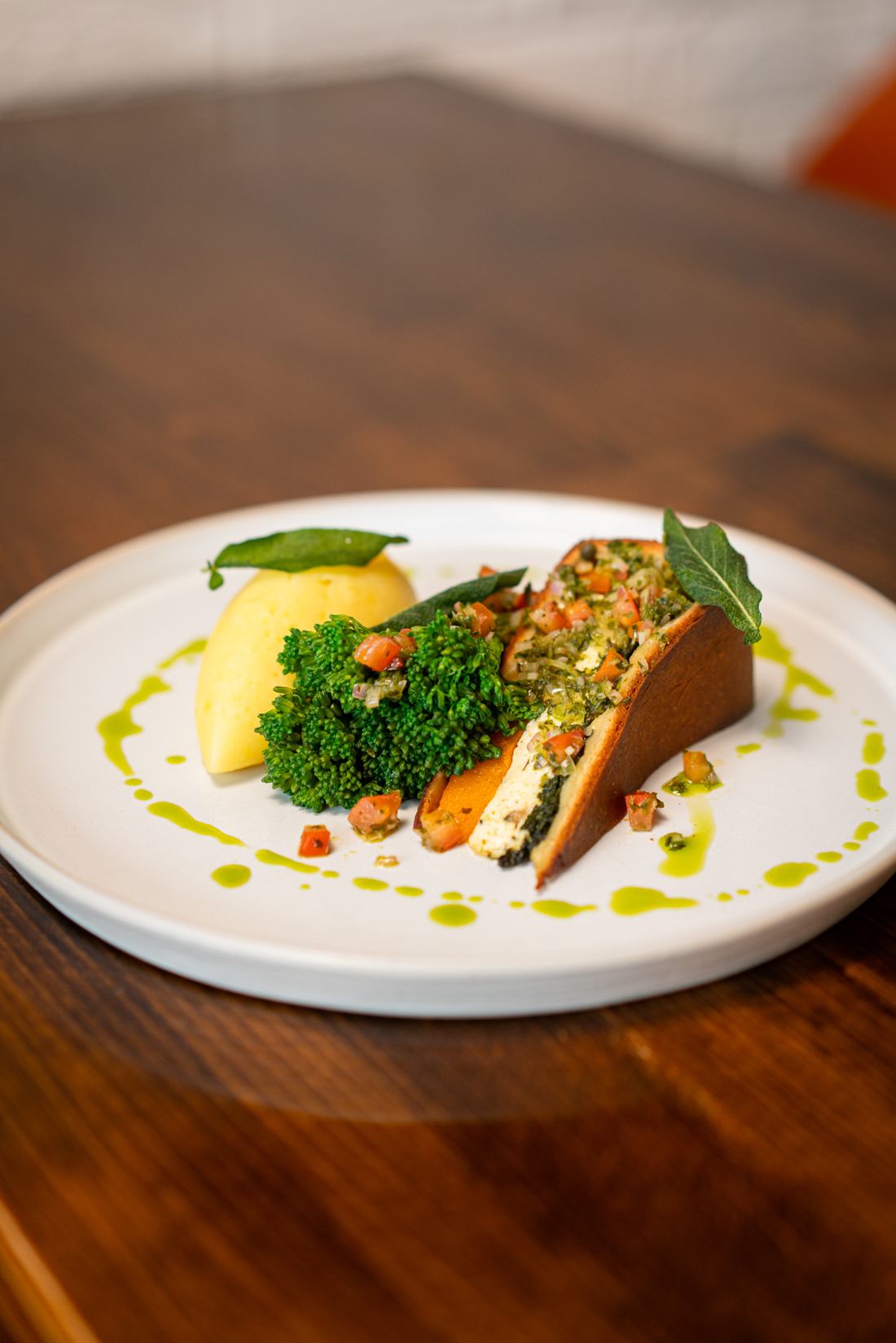 Butternut squash, ricotta and pine nut brioche pie, creamy mash and tenderstem broccoli at Edie’s restaurant