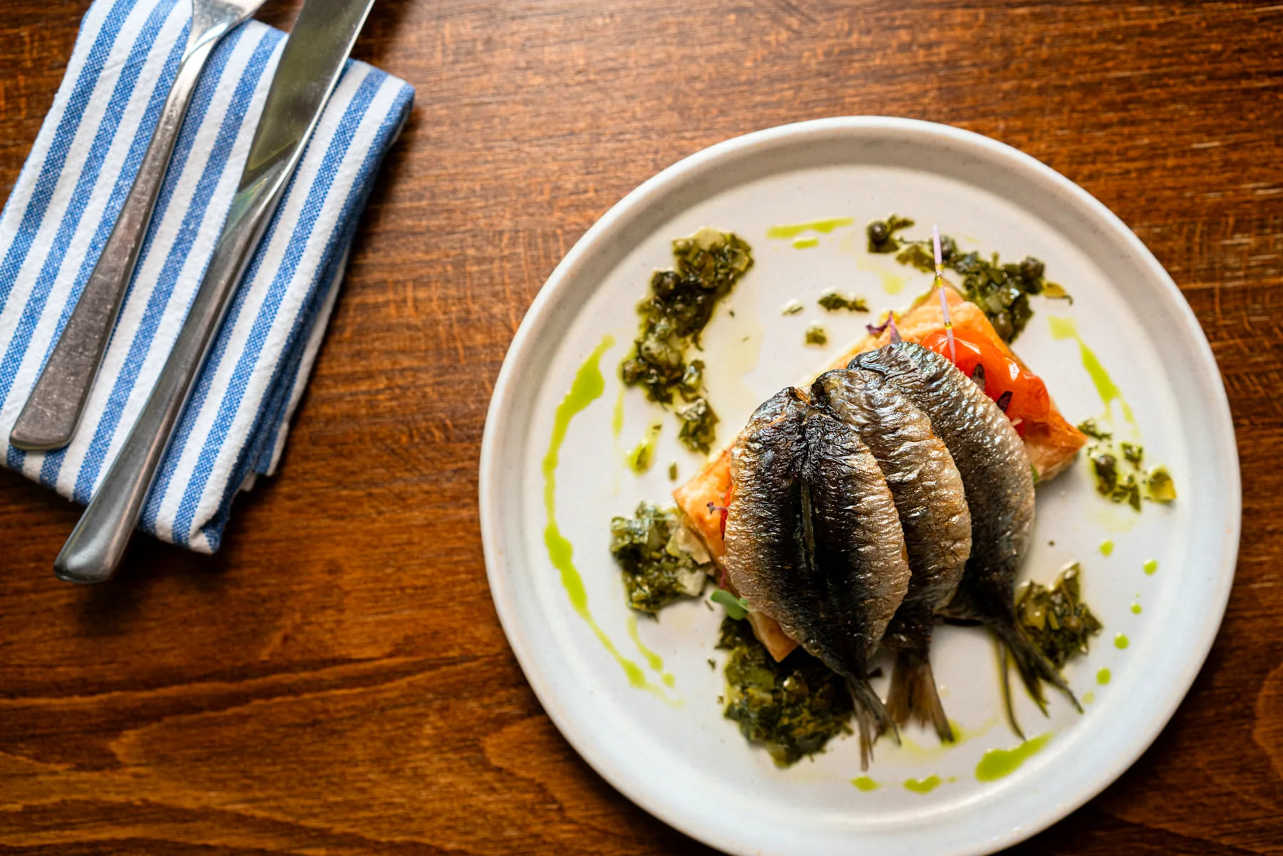 Sardines with cherry tomato and Lyonnaise onion tart at Edie's restaurant